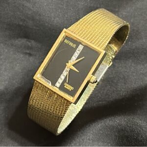 Vintage 80s Benrus Black and Diamanté Watch with Gold tone bracelet. non working